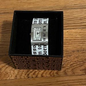 L.A.M.B. white & black “Born to Blossom, Bloom to Perish” watch